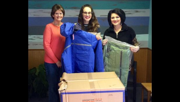 Family Counseling Center, FCC, in Vienna received several adult sized coats as part of this year’s NCNH Campaign. From left are WIBH sales manager Shawnna Rhine, FCC administrative staff member Kara Lawrence and SMTD operations manager Tiffany Ray. Photo provided. 