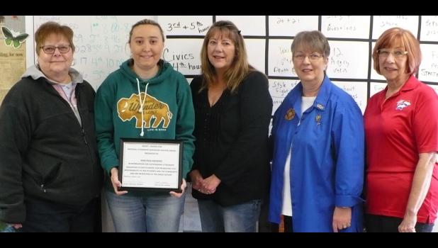 From left are Lynn Smith, 15th District president, Auxiliary to the VFW; Jamie Nash-Mayberry; Dianna Robertson, president of Carroll P. Foster Auxiliary No. 3455; Linda Jackson, sponsor; and Jo Lynn Alvatter, national council member, who presented Nash-Mayberry with the citation and check. Photo provided.