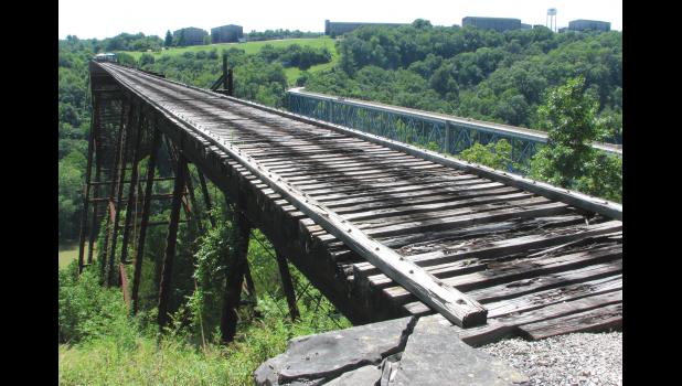 Young's High Bridge is the proverbial "end of the line" for the first leg of the Bluegrass Scenic Railroad and Museum's excursion. A highway can be seen to the right of the bridge. The museum's website notes that the bridge was built in 1889. On the day of our visit, folks were jumping off the bridge...bungee jumping, that is.