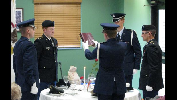 A Southern Illinois University Carbondale Army/Air Force ROTC color guard conducted a Missing Man Table and Honors Ceremony.
